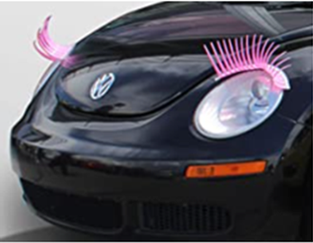 pink vw beetle with eyelashes